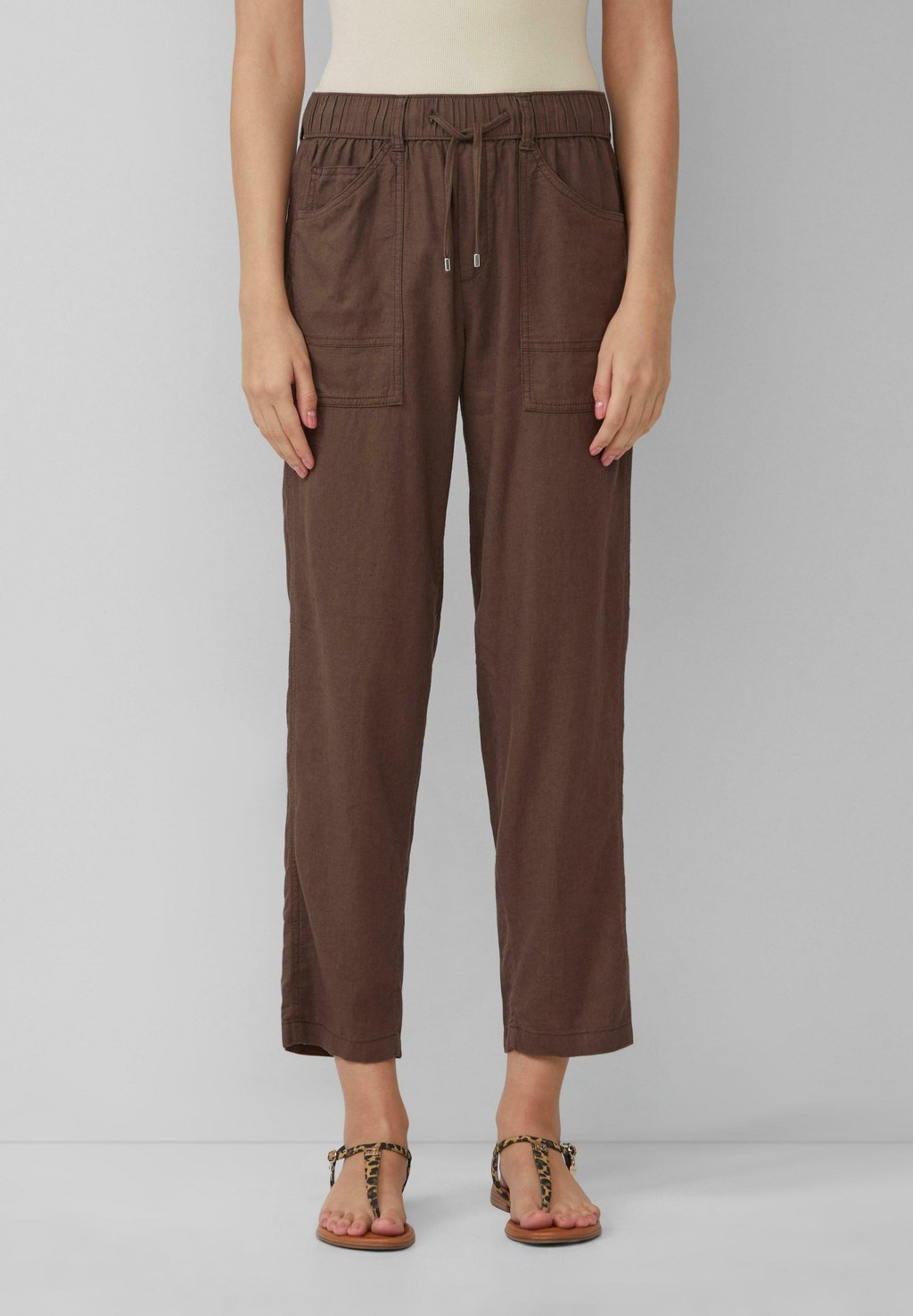 Брюки MIT ELASTIKBUND s.Oliver, темно-коричневый
Брюки MIT ELASTIKBUND s.Oliver, темно-коричневый