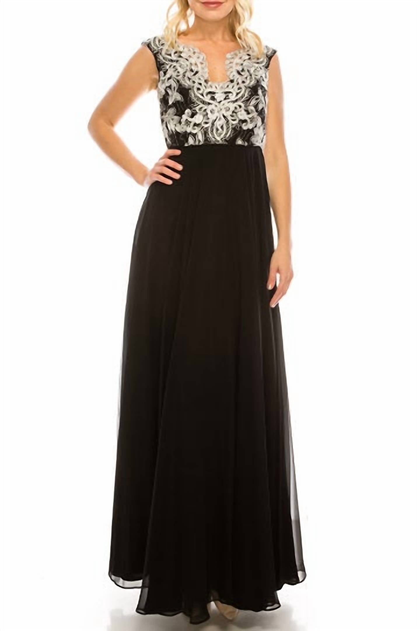 Металлизированное кружевное платье цвета слоновой кости и черного Aidan Mattox
Металлизированное кружевное платье цвета слоновой кости и черного Aidan Mattox