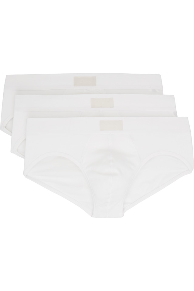 Тройная упаковка белых хлопковых трусов Skims Skims, цвет chalk
Тройная упаковка белых хлопковых трусов Skims Skims, цвет chalk