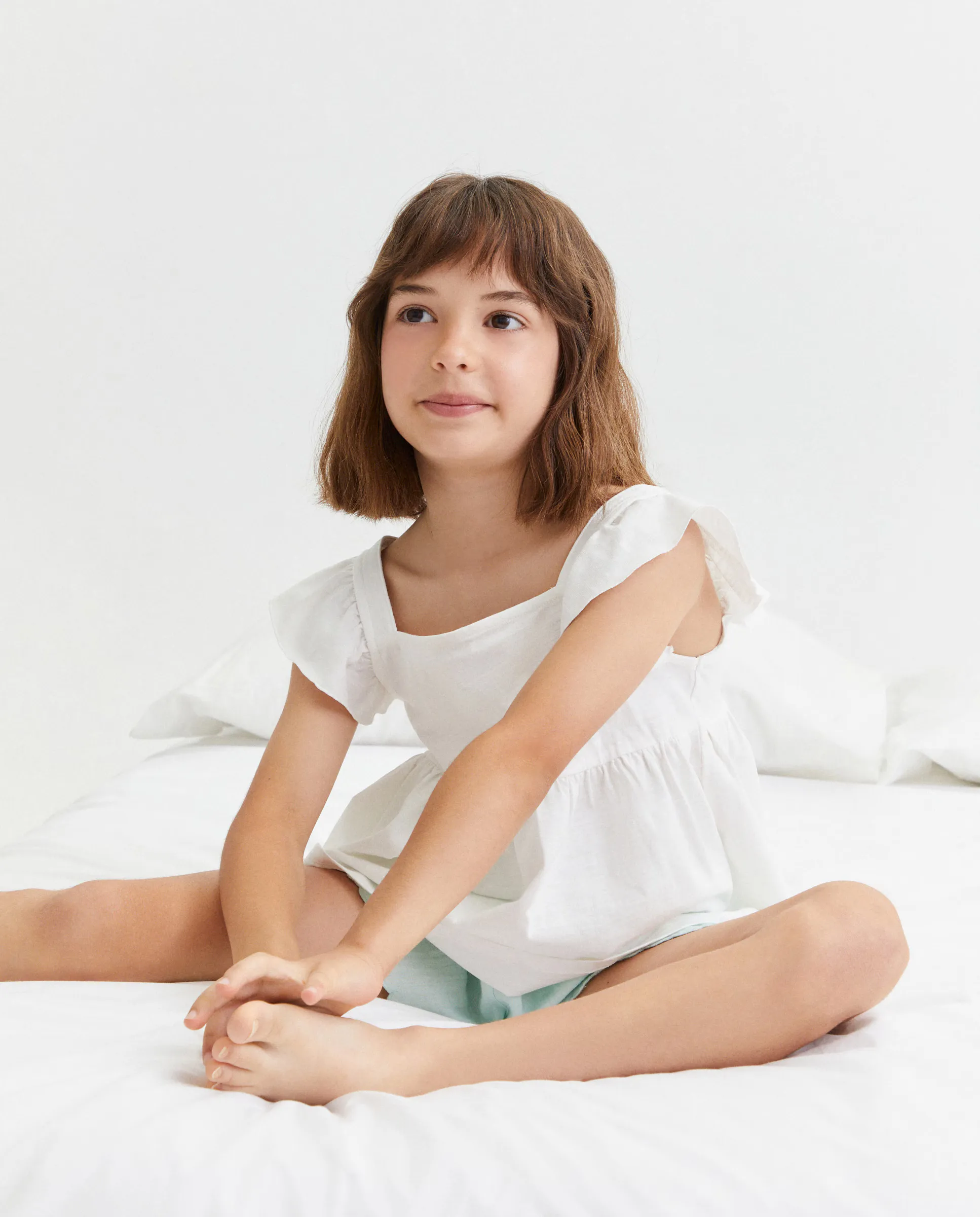 Детская майка с рюшами и эффектом неоднородной ткани Cotton Juice, белый
Детская майка с рюшами и эффектом неоднородной ткани Cotton Juice, белый