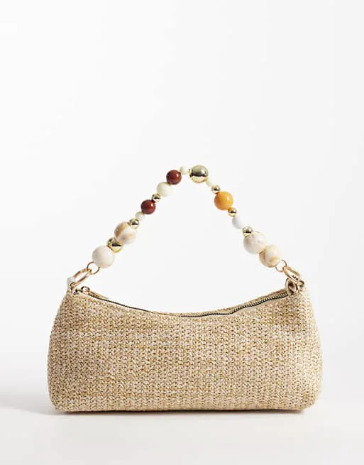 Сумка на плечо New Look с ручкой из бисера и рафией
Сумка на плечо New Look с ручкой из бисера и рафией