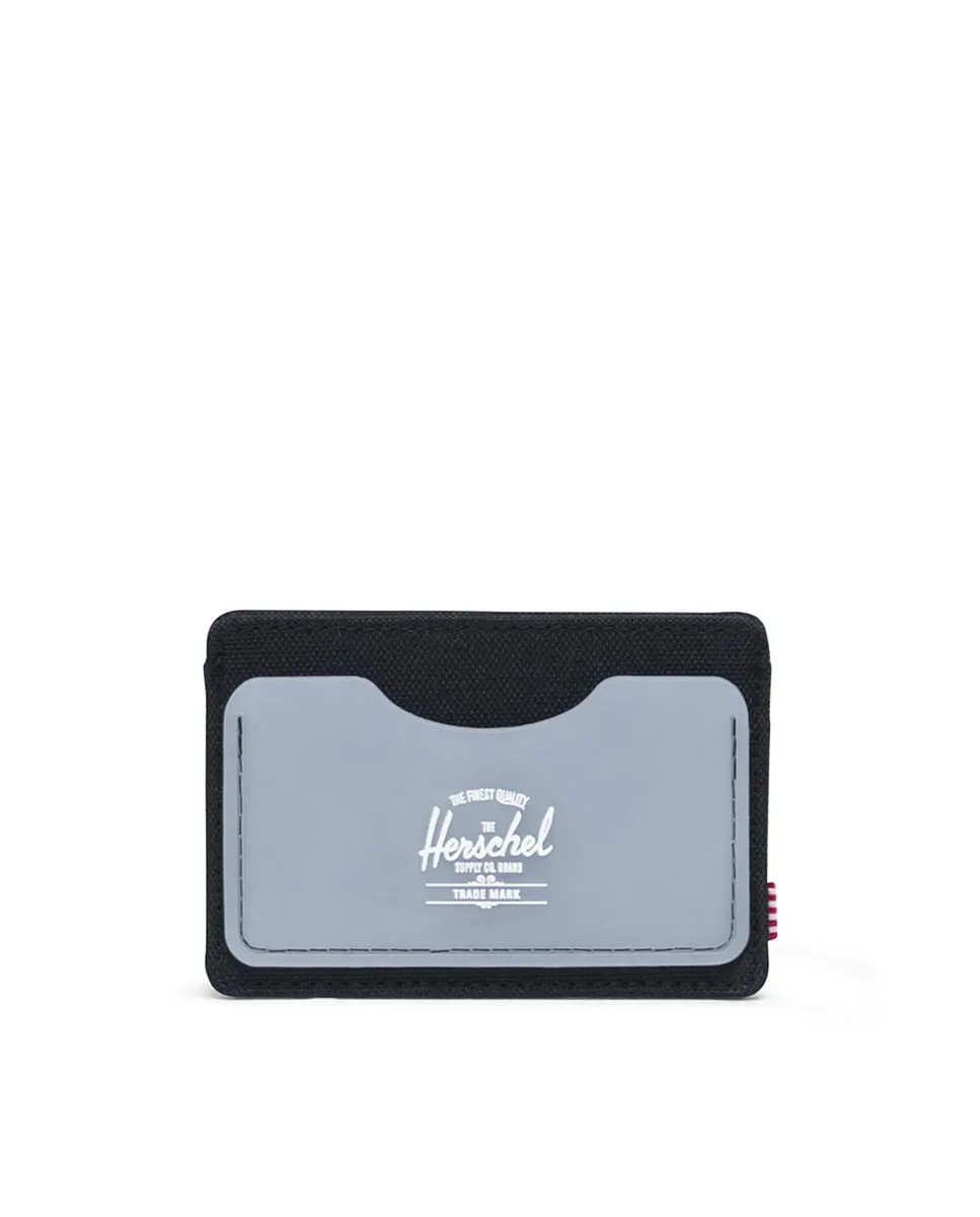 Унисекс кошелек из ткани с деталями из резины Herschel, серый/черный
Унисекс кошелек из ткани с деталями из резины Herschel, серый/черный