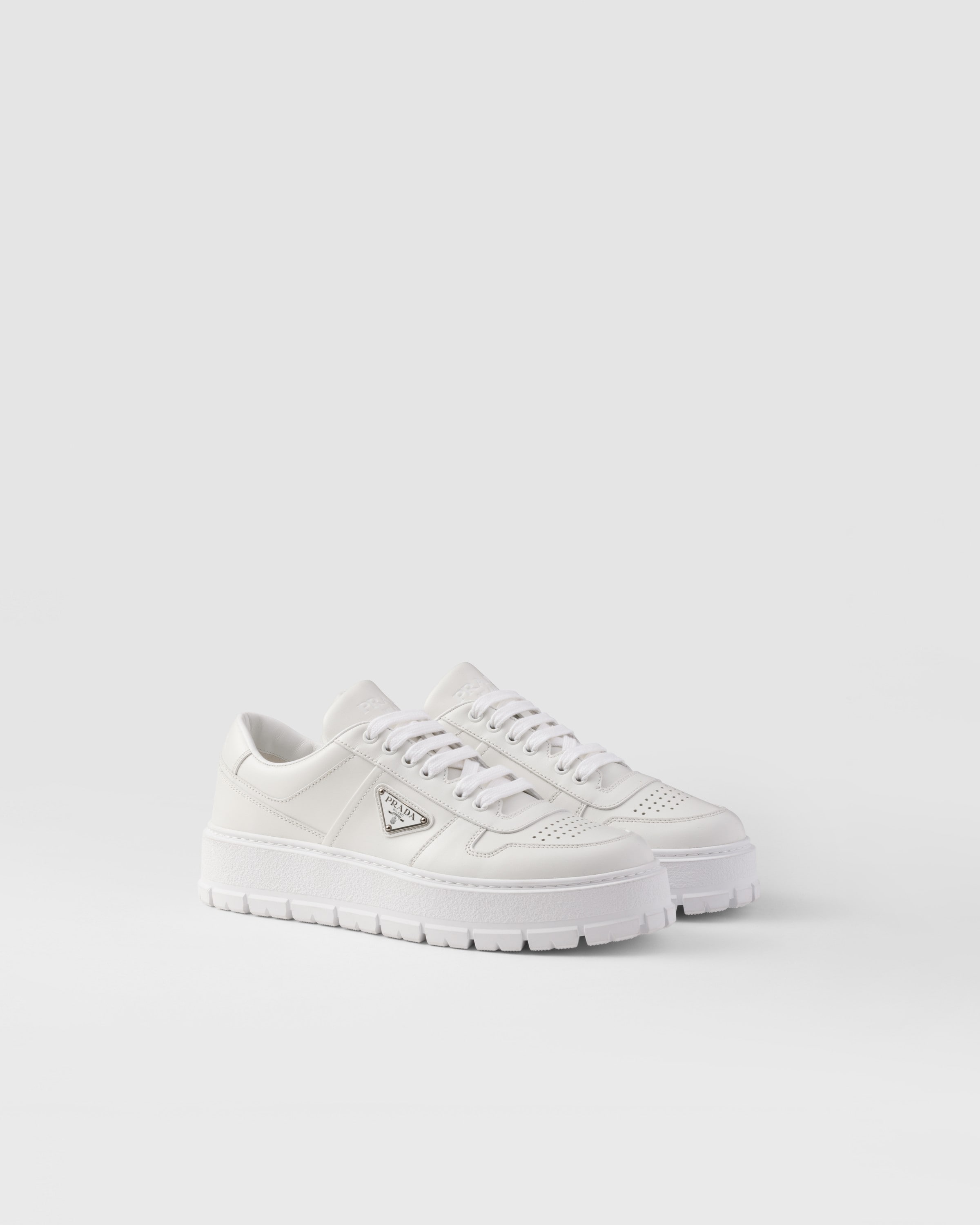 Кожаные кроссовки Prada, белый
Кожаные кроссовки Prada, белый