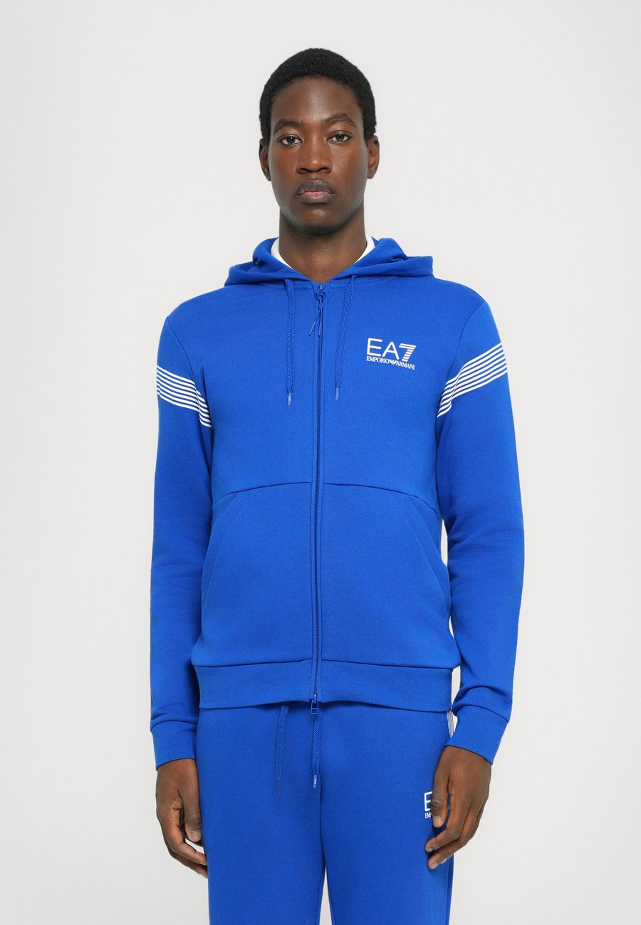 Худи EA7 Emporio Armani TRAIN 7 LINES HOODIE, Surf The Web/Blue
Худи EA7 Emporio Armani TRAIN 7 LINES HOODIE, Surf The Web/Blue