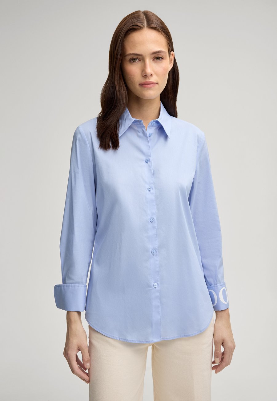 Блуза JOOP! BELLI, Hellblau/Light Blue
Блуза JOOP! BELLI, Hellblau/Light Blue