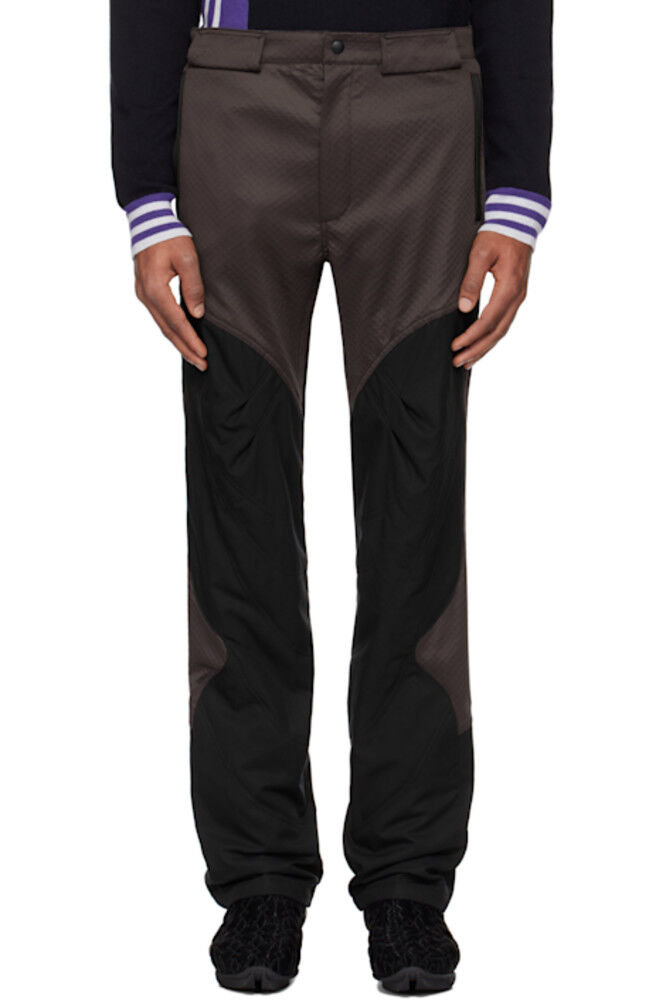 Коричневые и черные брюки на молнии Solix Kiko Kostadinov
Коричневые и черные брюки на молнии Solix Kiko Kostadinov