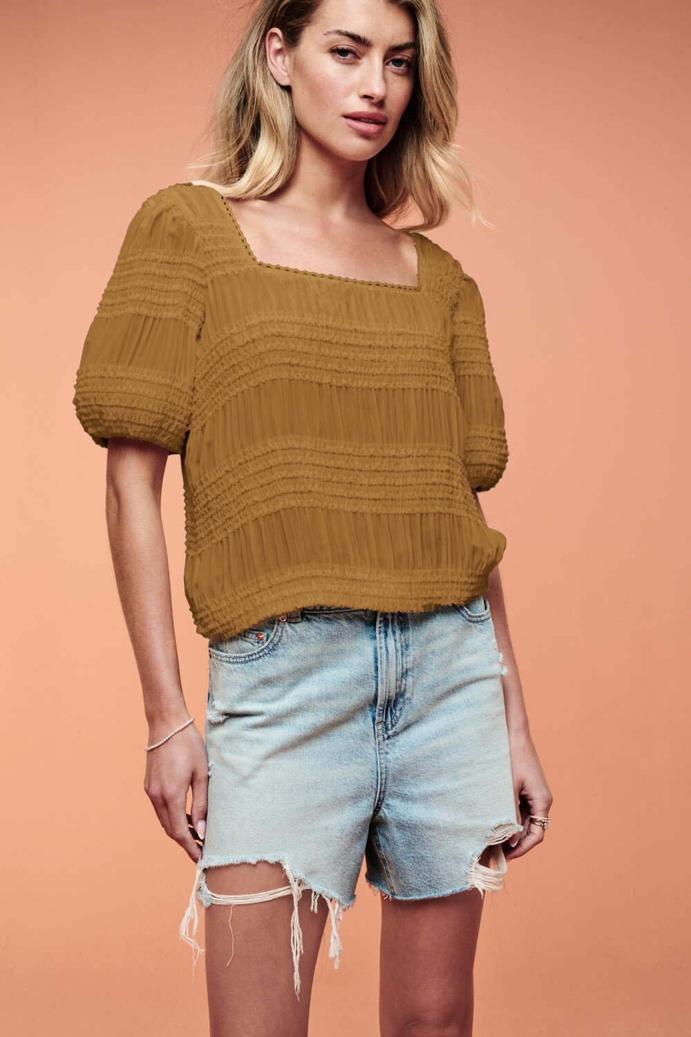 Блуза со сборками короткими рукавами и завязкой сзади Next, желтый
Блуза со сборками короткими рукавами и завязкой сзади Next, желтый