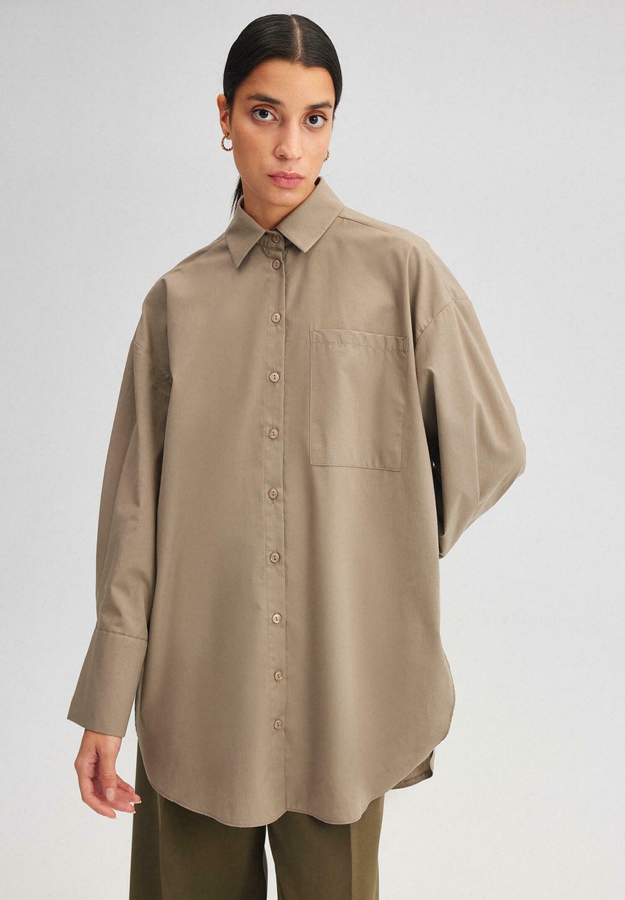Блуза Touché Privé Button-down blouse, Mink/Sand
Блуза Touché Privé Button-down blouse, Mink/Sand