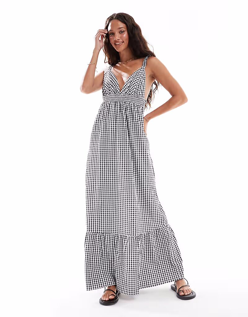 Платье макси Vero Moda с глубоким вырезом спереди в черную клетку с принтом в клетку
Платье макси Vero Moda с глубоким вырезом спереди в черную клетку с принтом в клетку