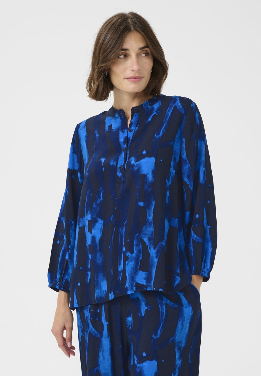 Блуза Culture ASHLEY CHAINA, Blue Graphic/Blue
Блуза Culture ASHLEY CHAINA, Blue Graphic/Blue