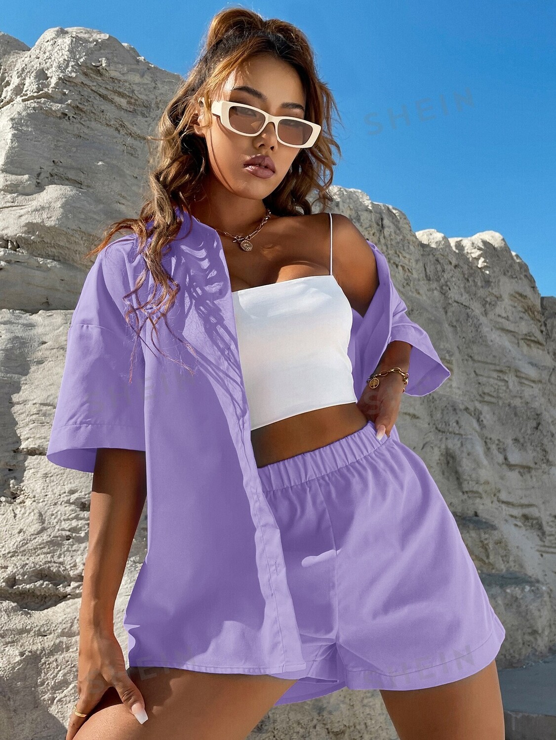 EZwear: Простая рубашка с пуговицами спереди, заниженной линией плеча и шортами Shein, сиреневый/фиолетовый
EZwear: Простая рубашка с пуговицами спереди, заниженной линией плеча и шортами Shein, сиреневый/фиолетовый