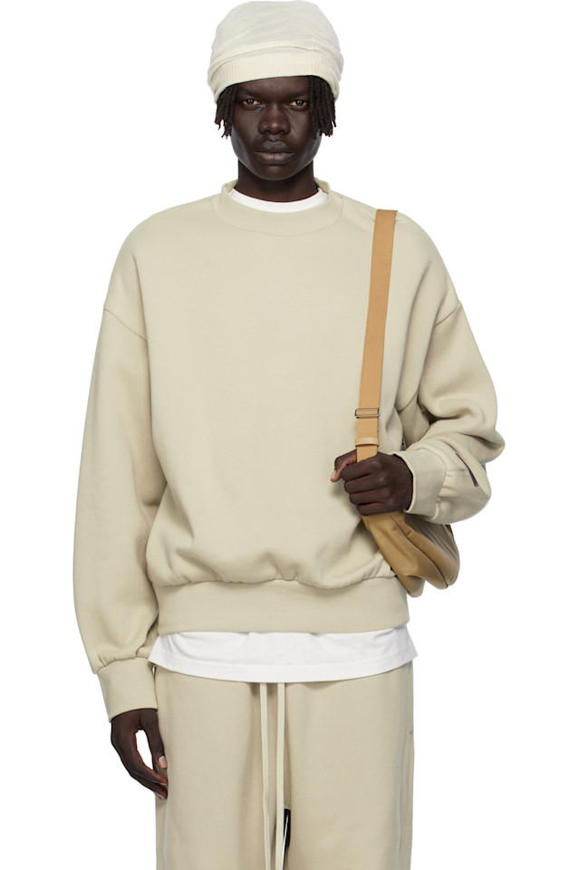 Fear Of God Essentials Классическая флисовая толстовка с круглым вырезом бежевого цвета
Fear Of God Essentials Классическая флисовая толстовка с круглым вырезом бежевого цвета