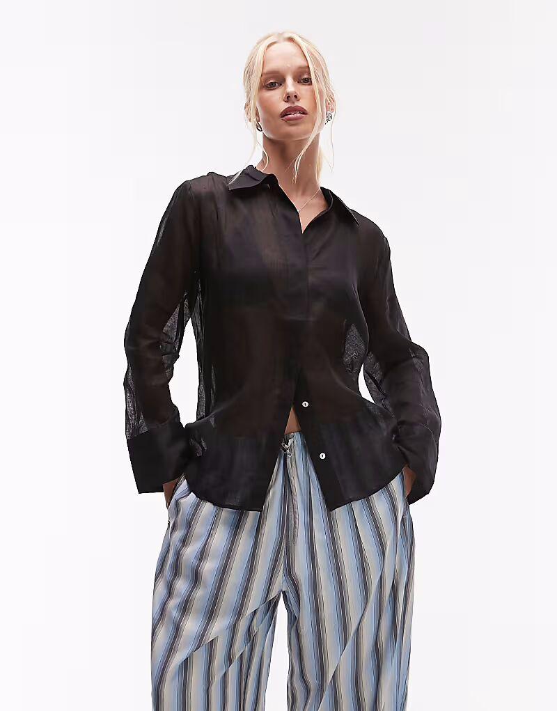 Легкая рубашка из рами Mango черного цвета
Легкая рубашка из рами Mango черного цвета