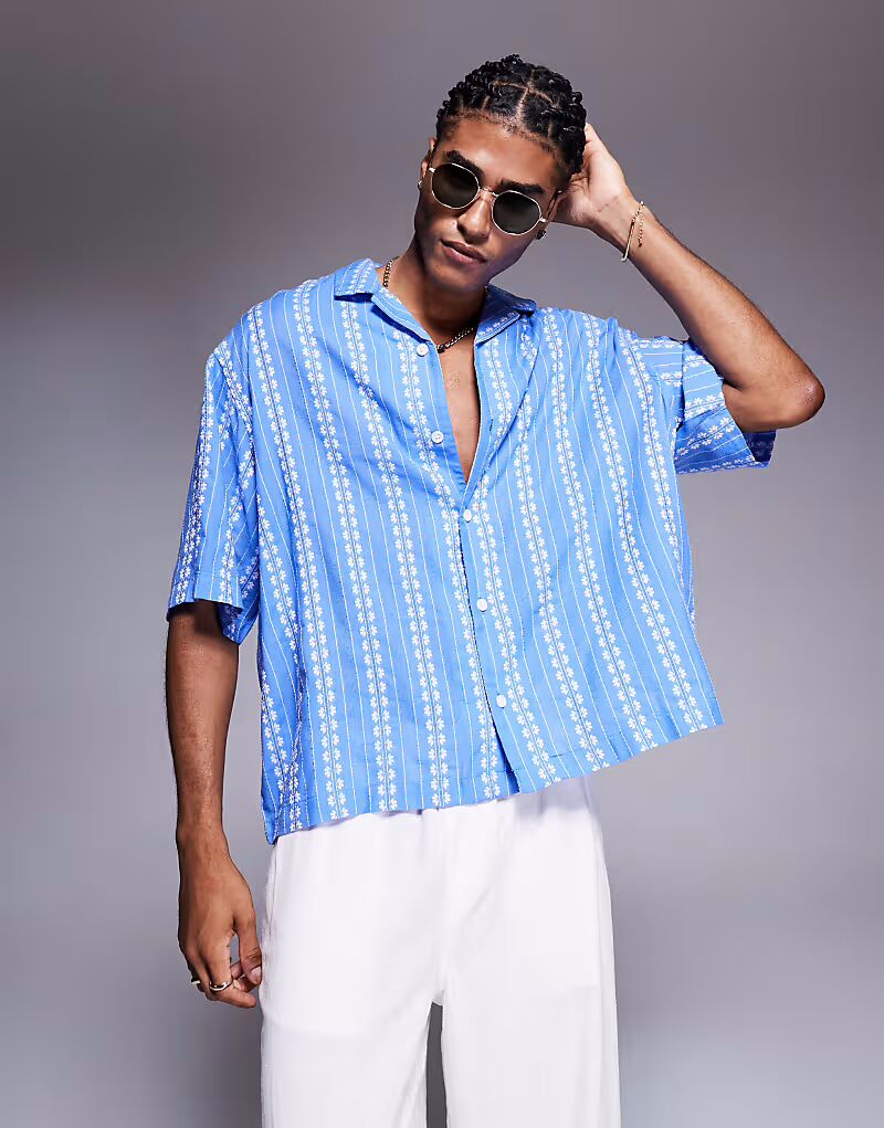 Рубашка свободного кроя ASOS DESIGN Revere с цветочным жаккардом синего цвета
Рубашка свободного кроя ASOS DESIGN Revere с цветочным жаккардом синего цвета