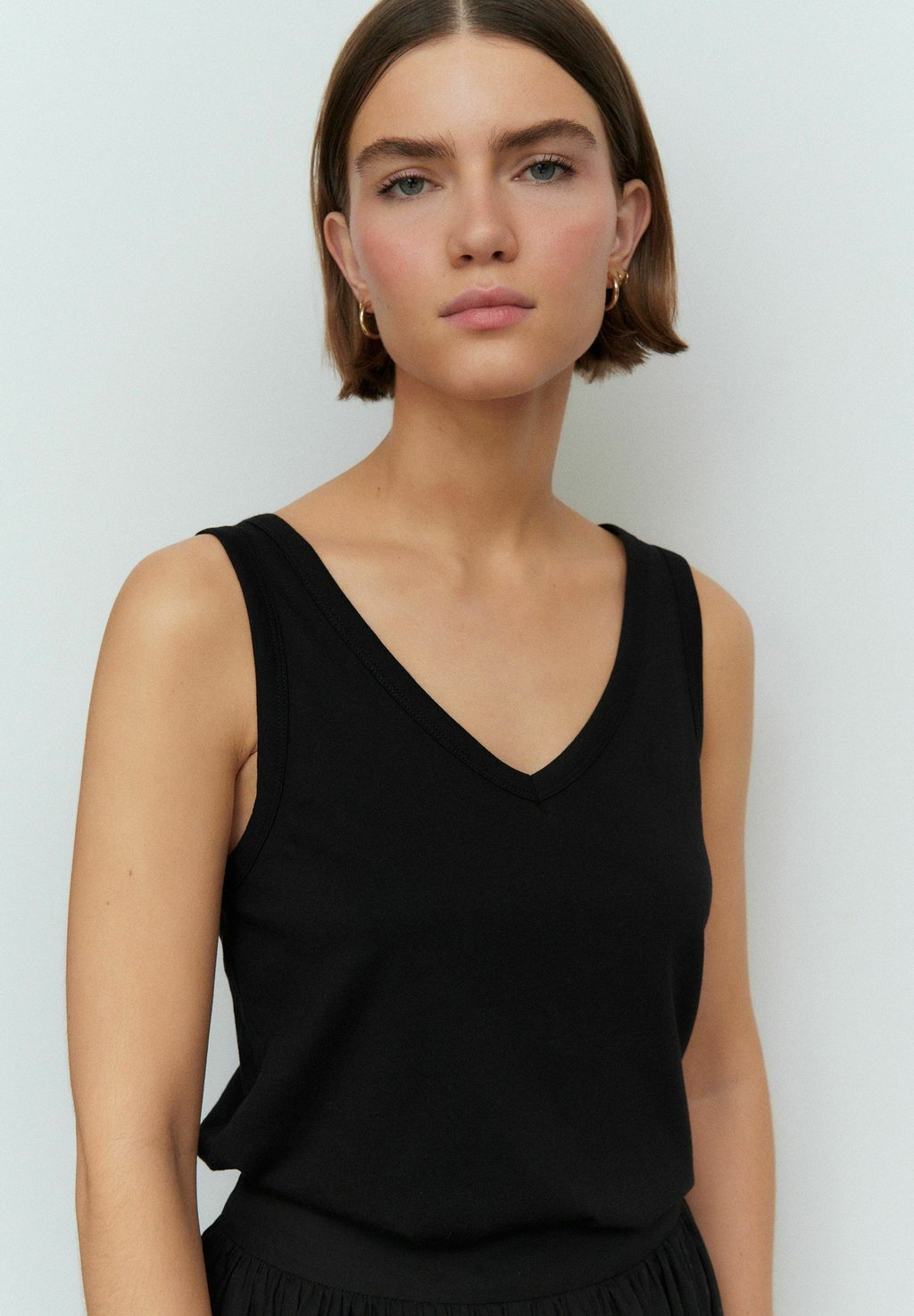 Топ SLOUCH Next, черный
Топ SLOUCH Next, черный