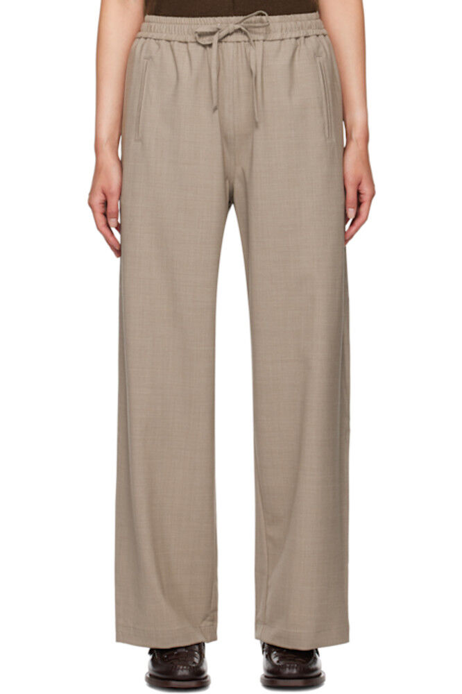 Свободные брюки серо-коричневого цвета пошива Cordera 
Свободные брюки серо-коричневого цвета пошива Cordera