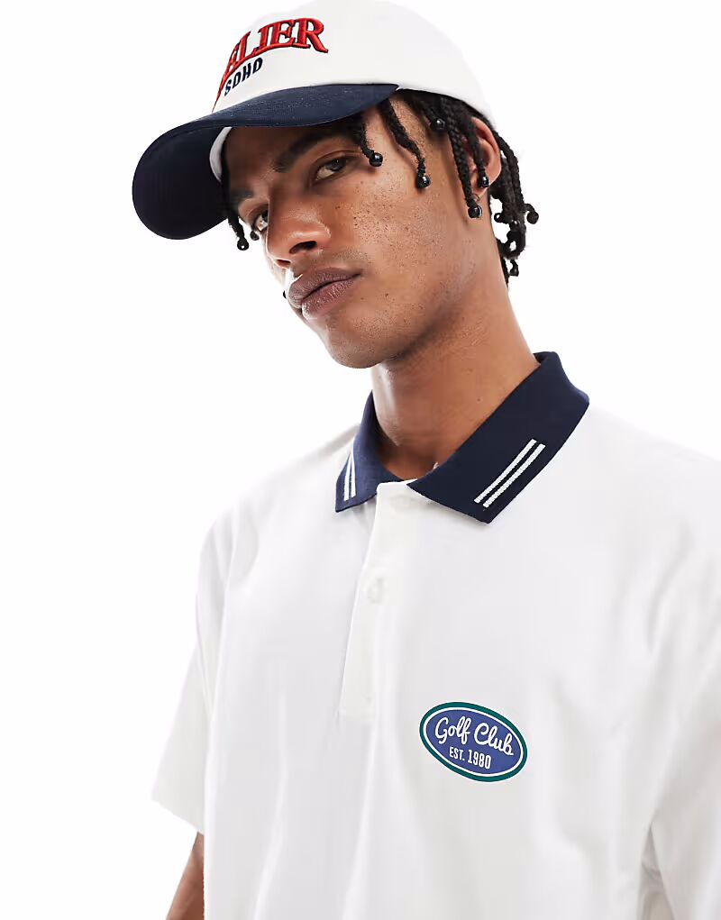 Свободное поло ASOS DESIGN с принтом гольфа спереди белого цвета 
Свободное поло ASOS DESIGN с принтом гольфа спереди белого цвета