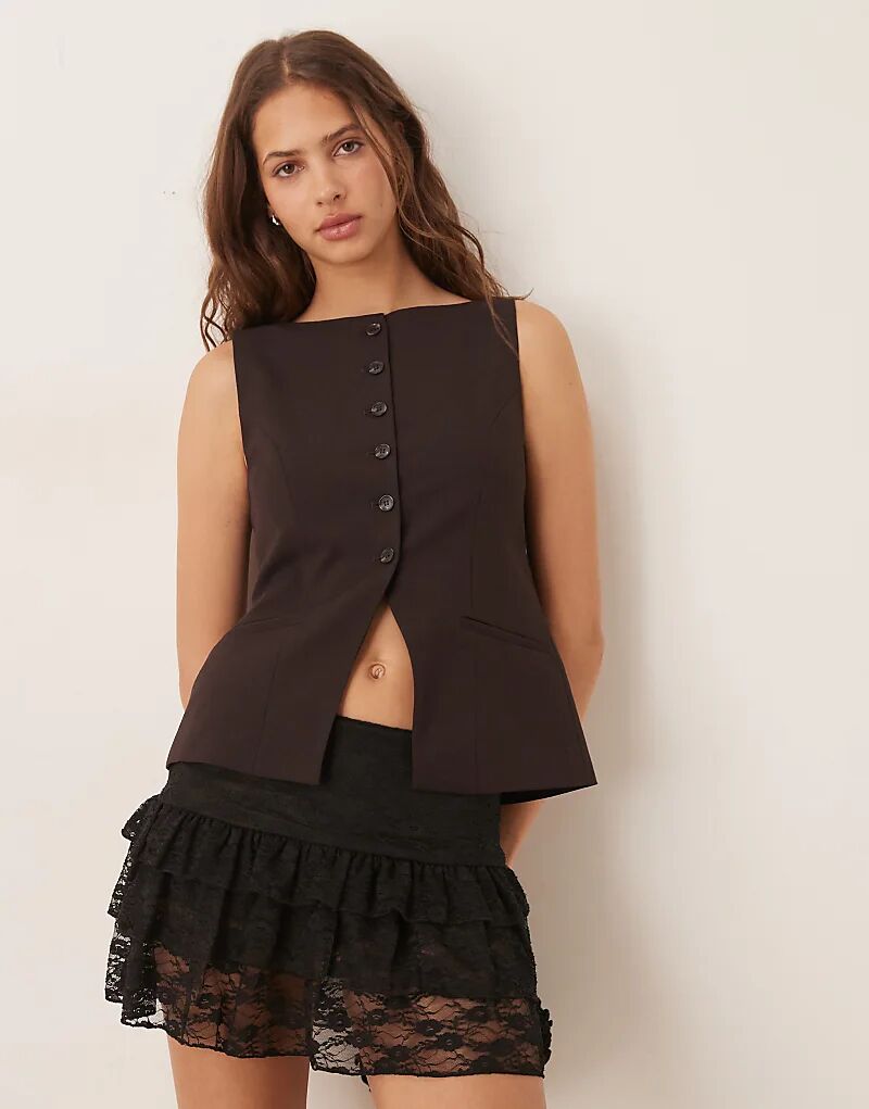 Жилет Gina Tricot с вырезом-лодочкой черного цвета
Жилет Gina Tricot с вырезом-лодочкой черного цвета