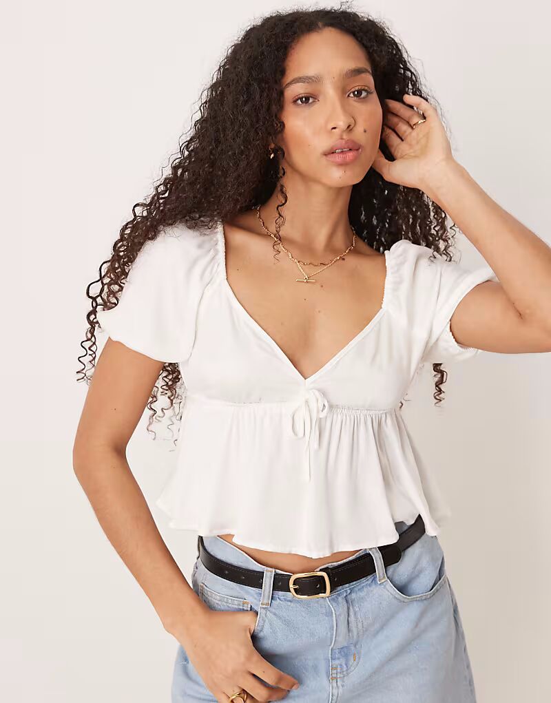 Блузка Pimkie с завязками спереди и пышными рукавами-буфами белого цвета
Блузка Pimkie с завязками спереди и пышными рукавами-буфами белого цвета