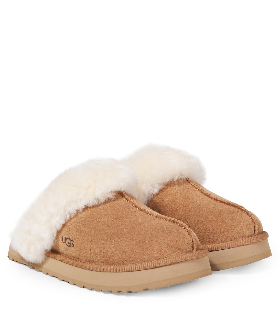 Замшевые тапочки Disquette с отделкой из овчины UGG Kids, Chestnut
Замшевые тапочки Disquette с отделкой из овчины UGG Kids, Chestnut