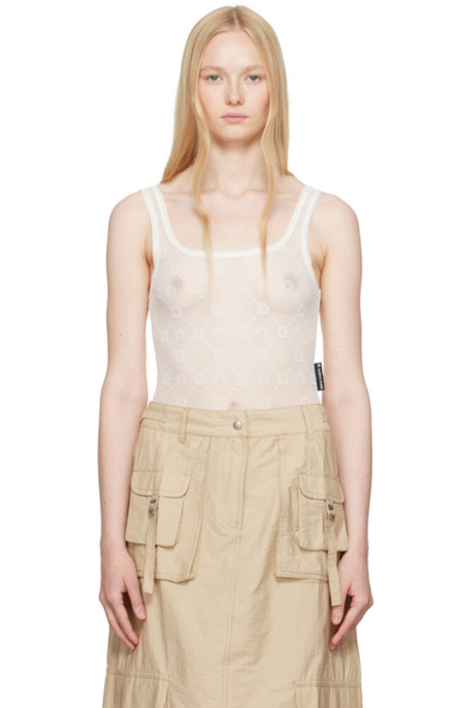 Белый боди из переработанной сетчатой ткани Marine Serre
Белый боди из переработанной сетчатой ткани Marine Serre