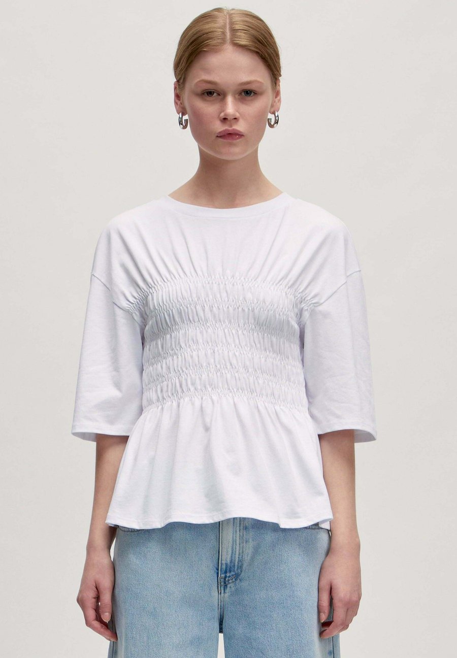Блуза EDITED NAYELI, Weiß/White
Блуза EDITED NAYELI, Weiß/White
