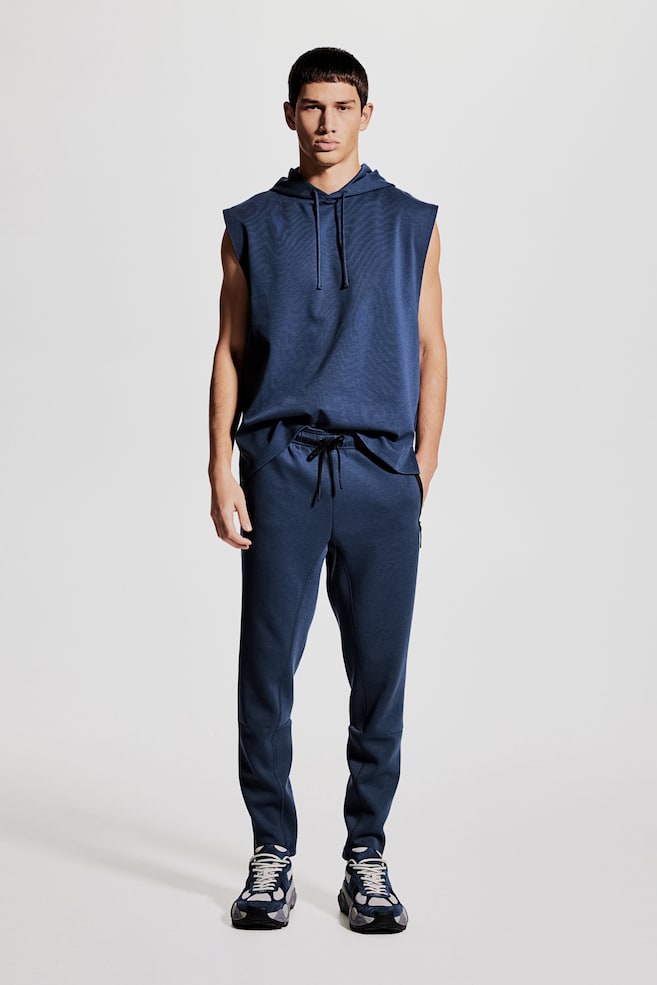 Спортивные штаны для бега из материала DryMove облегающего кроя H&M, синий
Спортивные штаны для бега из материала DryMove облегающего кроя H&M, синий