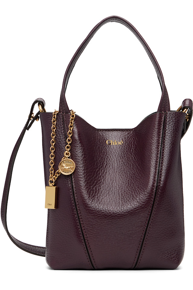 Chloé Маленькая коричневая вращающаяся сумка 'chloé'
Chloé Маленькая коричневая вращающаяся сумка 'chloé'