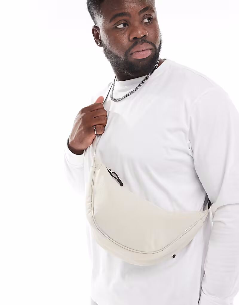 Сумка-пояс Jack & Jones через плечо кремового цвета
Сумка-пояс Jack & Jones через плечо кремового цвета