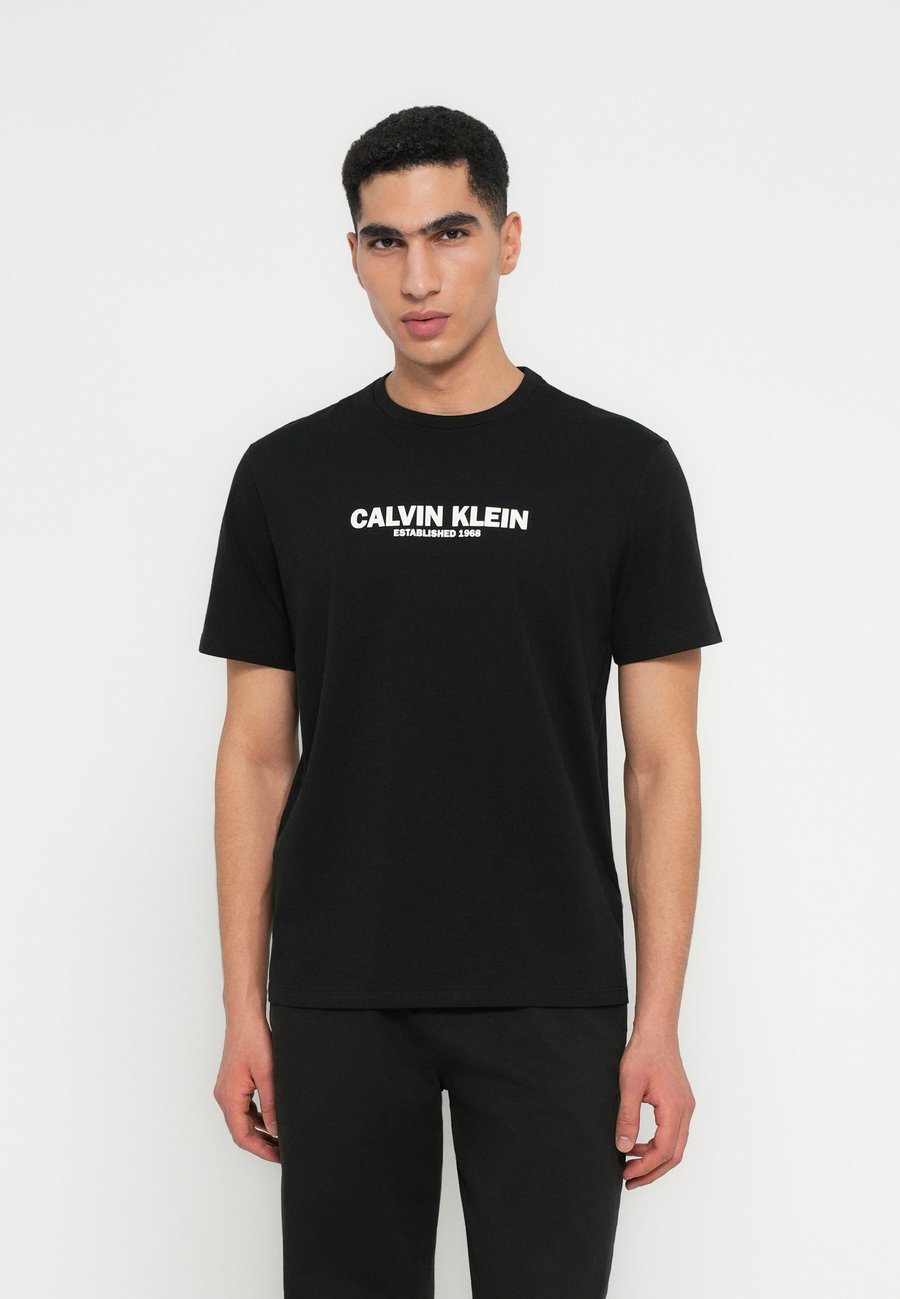 Футболка Calvin Klein GRAP UNISEX, Black, Черный, Футболка Calvin Klein GRAP UNISEX, Black
Футболка Calvin Klein GRAP UNISEX, Black, Черный, Футболка Calvin Klein GRAP UNISEX, Black