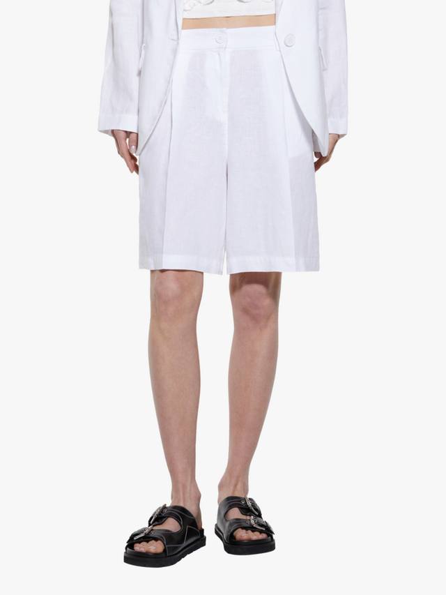 Высокие укороченные льняные бермуды SISLEY
Высокие укороченные льняные бермуды SISLEY