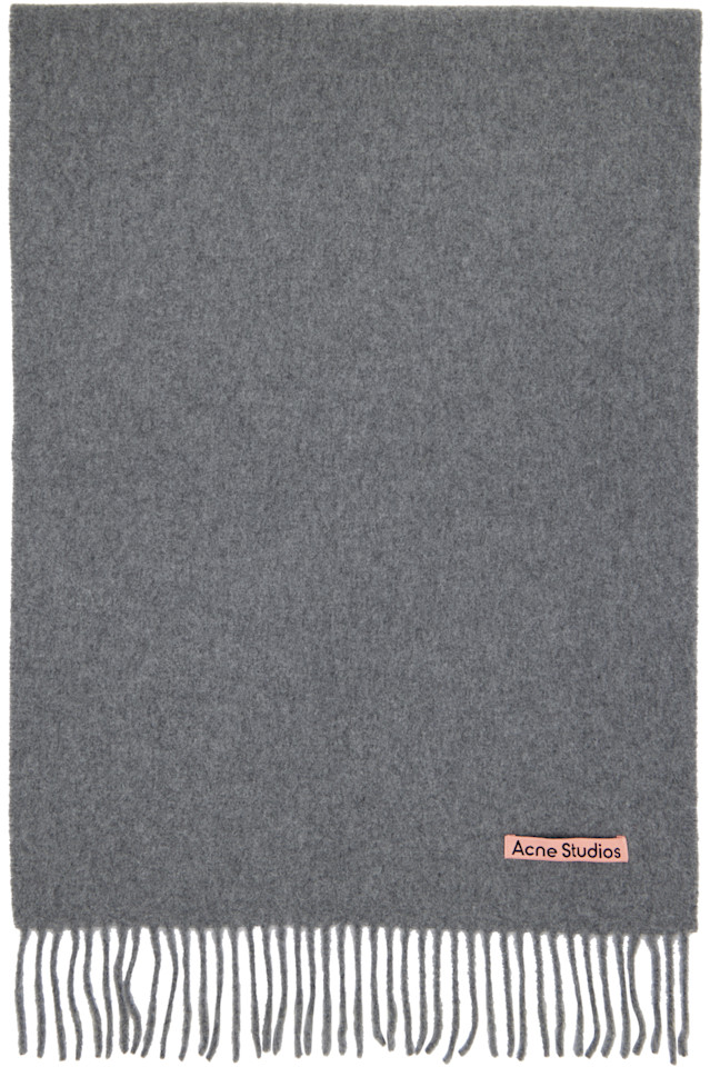 Acne Studios Узкий шерстяной шарф с бахромой серого цвета
Acne Studios Узкий шерстяной шарф с бахромой серого цвета