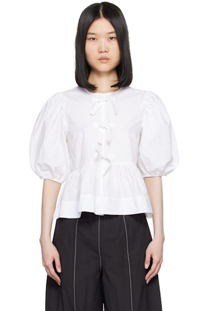 Белая блузка с завязкой-баской GANNI
Белая блузка с завязкой-баской GANNI