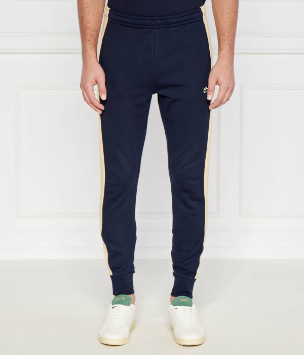 Спортивные брюки мужские Lacoste облегающего кроя с боковыми полосками, синий
Спортивные брюки мужские Lacoste облегающего кроя с боковыми полосками, синий