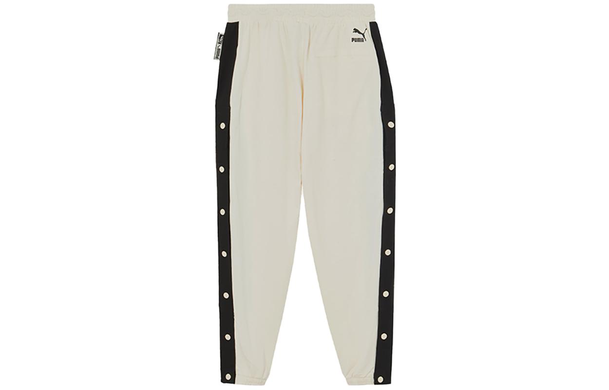 Вязаные спортивные штаны мужские экрю PUMA
Вязаные спортивные штаны мужские экрю PUMA