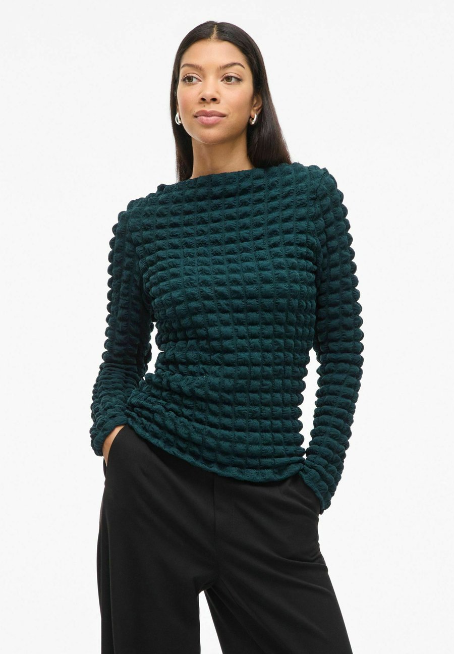 Топ VILA VIFORCEA U-BOOT-AUSSCHNITT, Ponderosa Pine/Evergreen
Топ VILA VIFORCEA U-BOOT-AUSSCHNITT, Ponderosa Pine/Evergreen