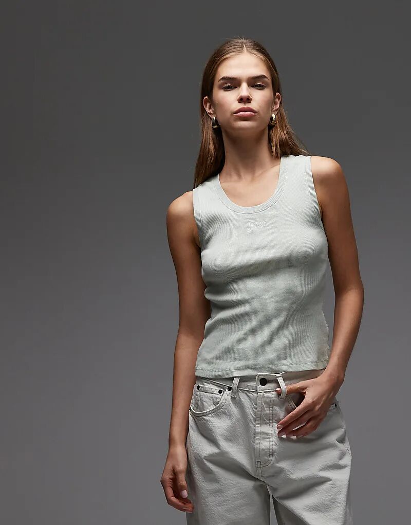 Майка Tommy Jeans с надписью-логотипом в рубчик зеленого цвета
Майка Tommy Jeans с надписью-логотипом в рубчик зеленого цвета