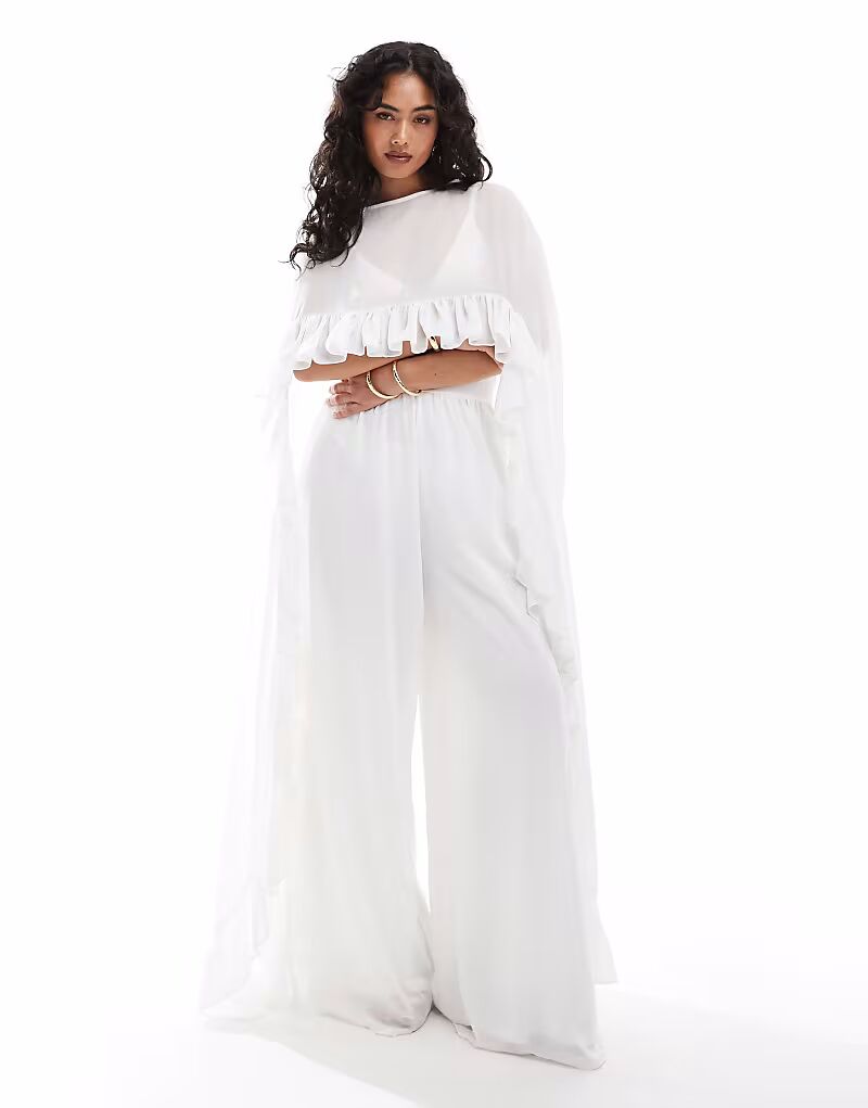 Топ TFNC cape top with ruffle detail in cream co-ord
Топ TFNC cape top with ruffle detail in cream co-ord