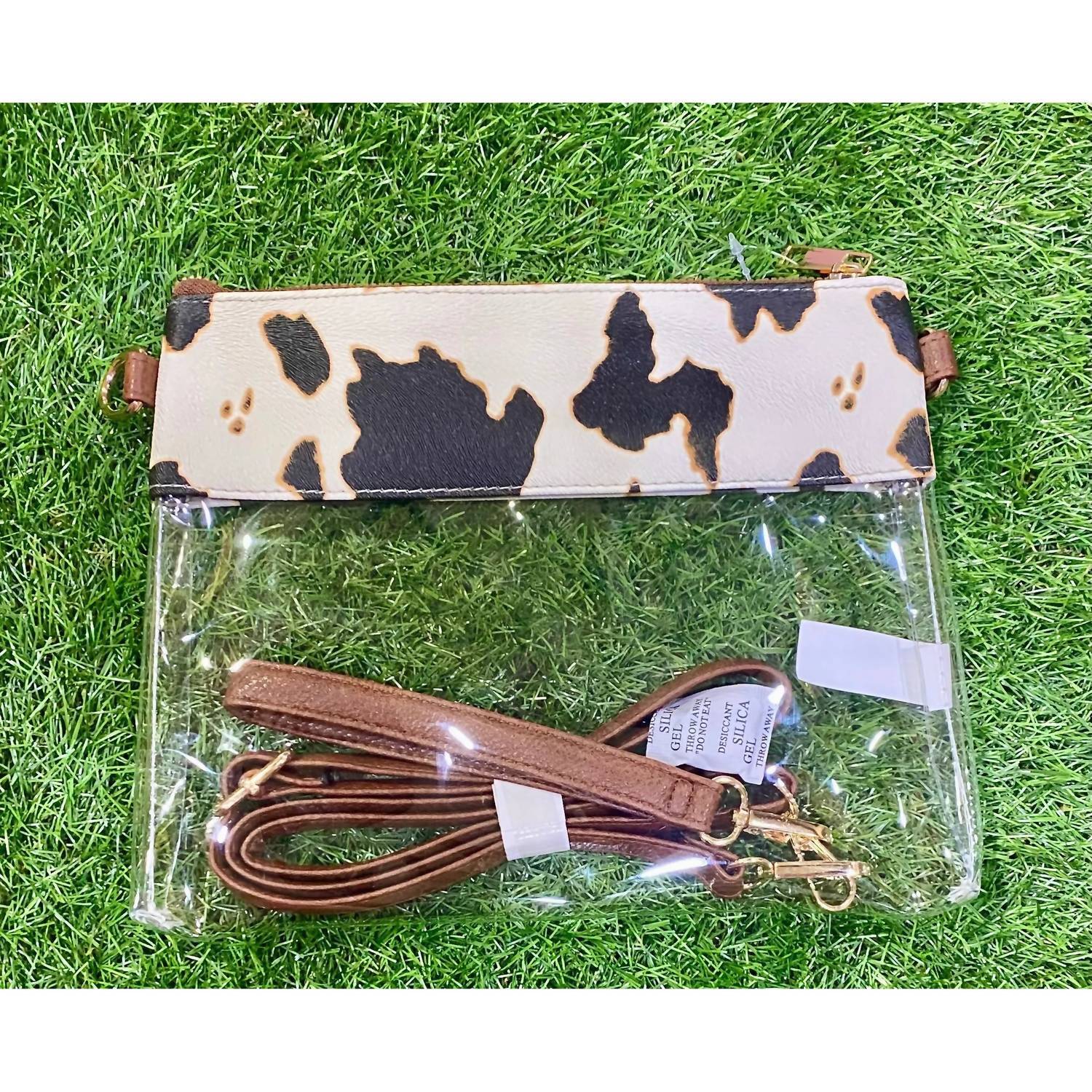 Сумка кросс-боди Game Day с отделкой из экокожи в коровьем принте MiMi Wholesale, Cow
Сумка кросс-боди Game Day с отделкой из экокожи в коровьем принте MiMi Wholesale, Cow