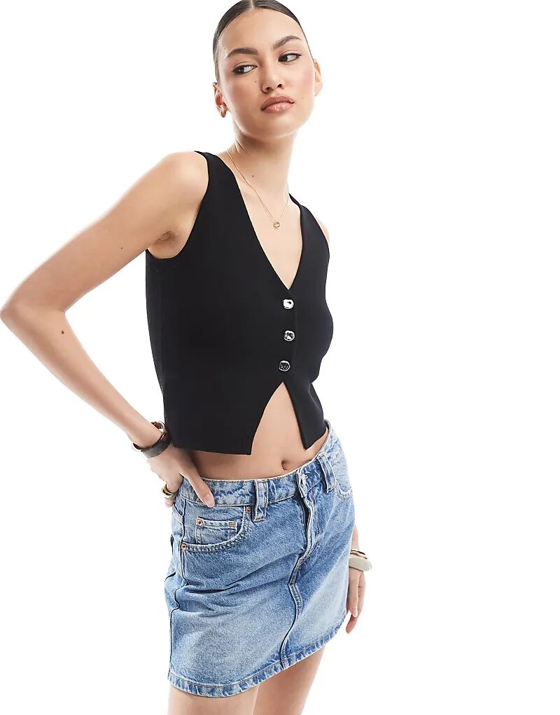 Трикотажный топ Stradivarius с пуговицами черного цвета
Трикотажный топ Stradivarius с пуговицами черного цвета