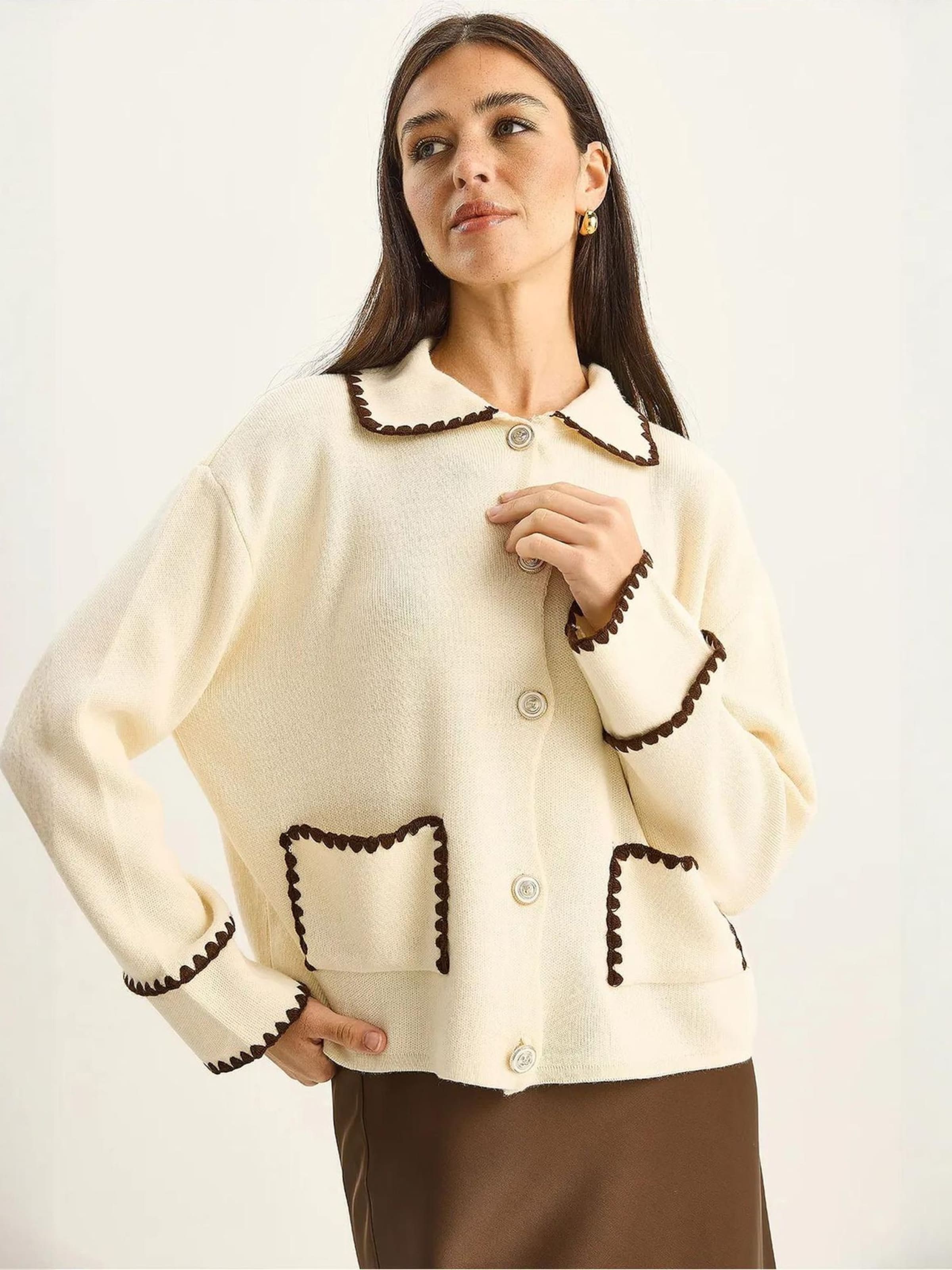 Bianco Lucci Вязаный кардиган в бежевом цвете
Bianco Lucci Вязаный кардиган в бежевом цвете