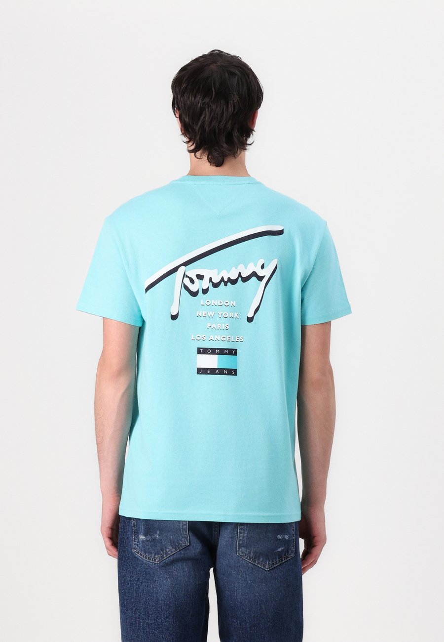 Футболка Tommy Jeans SIGNATURE CITY, Lagoon Green/Green
Футболка Tommy Jeans SIGNATURE CITY, Lagoon Green/Green