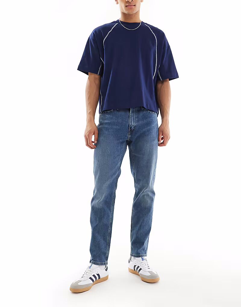 Джинсы Levi's 541 Athletic Tapered Fit, средняя посадка
Джинсы Levi's 541 Athletic Tapered Fit, средняя посадка