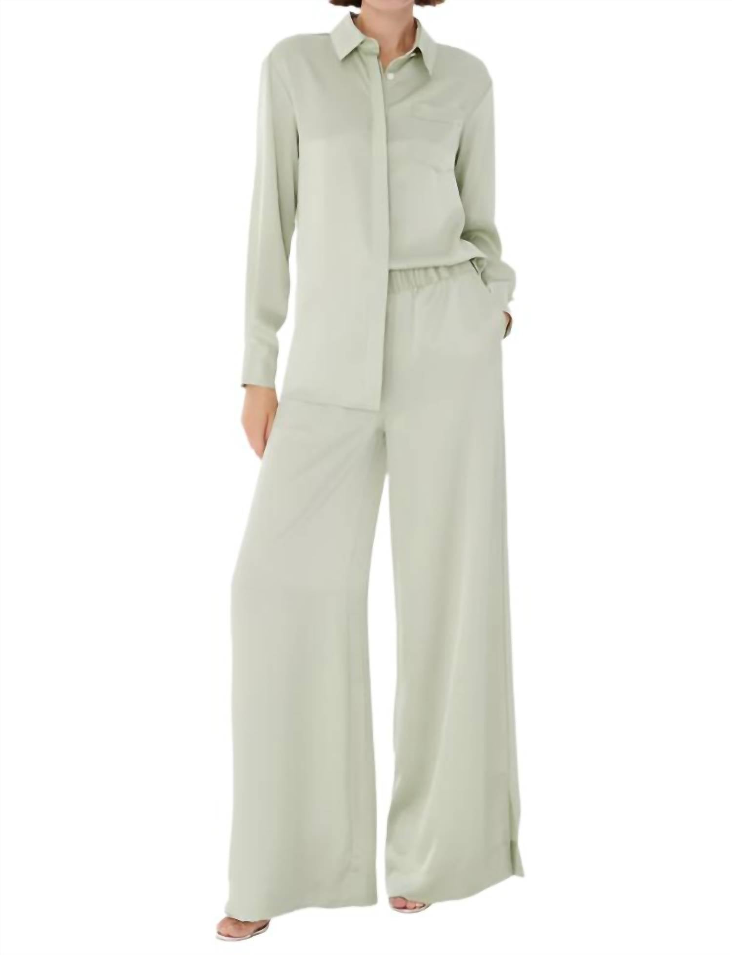 Auggie Брюки с боковыми разрезами на резинке в цвете мята Toccin, мятный
Auggie Брюки с боковыми разрезами на резинке в цвете мята Toccin, мятный