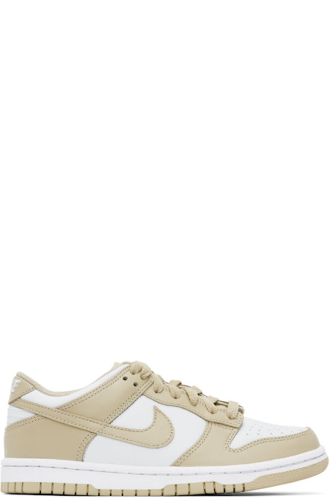 Большие детские бежево-белые низкие кеды Dunk Nike
Большие детские бежево-белые низкие кеды Dunk Nike