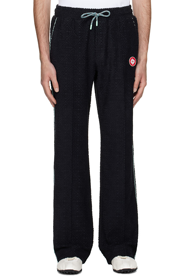 Монограммированные жаккардовые махровые спортивные брюки Casablanca, черный
Монограммированные жаккардовые махровые спортивные брюки Casablanca, черный