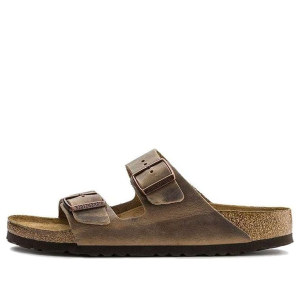 Тапочки arizona soft footbed oiled leather narrow fit 'tobacco brown' Birkenstock, коричневый
Тапочки arizona soft footbed oiled leather narrow fit 'tobacco brown' Birkenstock, коричневый