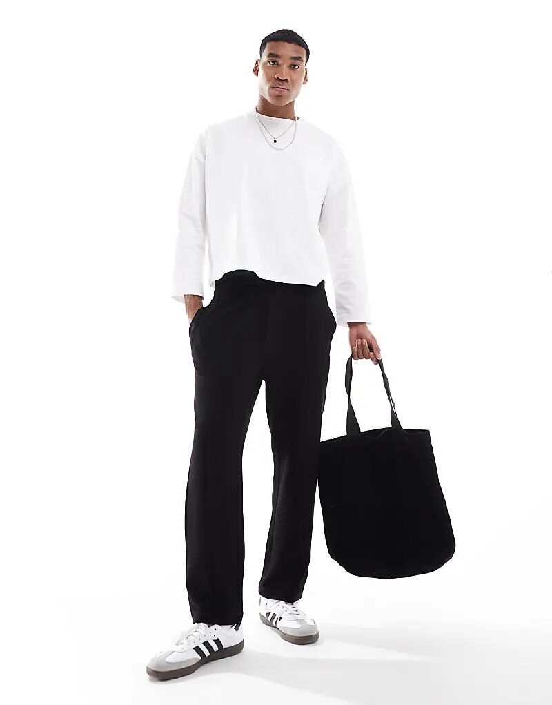 Трикотажные зауженные книзу джоггеры черного цвета с передним швом ONLY & SONS
Трикотажные зауженные книзу джоггеры черного цвета с передним швом ONLY & SONS