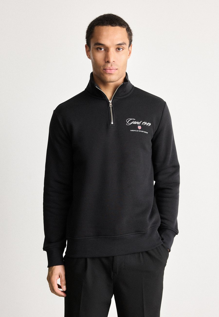 Толстовка GANT GRAPHIC HALF ZIP, Black
Толстовка GANT GRAPHIC HALF ZIP, Black