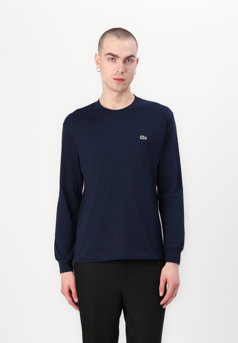 Топ Lacoste Long sleeved top, Navy Blue/Dark Blue
Топ Lacoste Long sleeved top, Navy Blue/Dark Blue